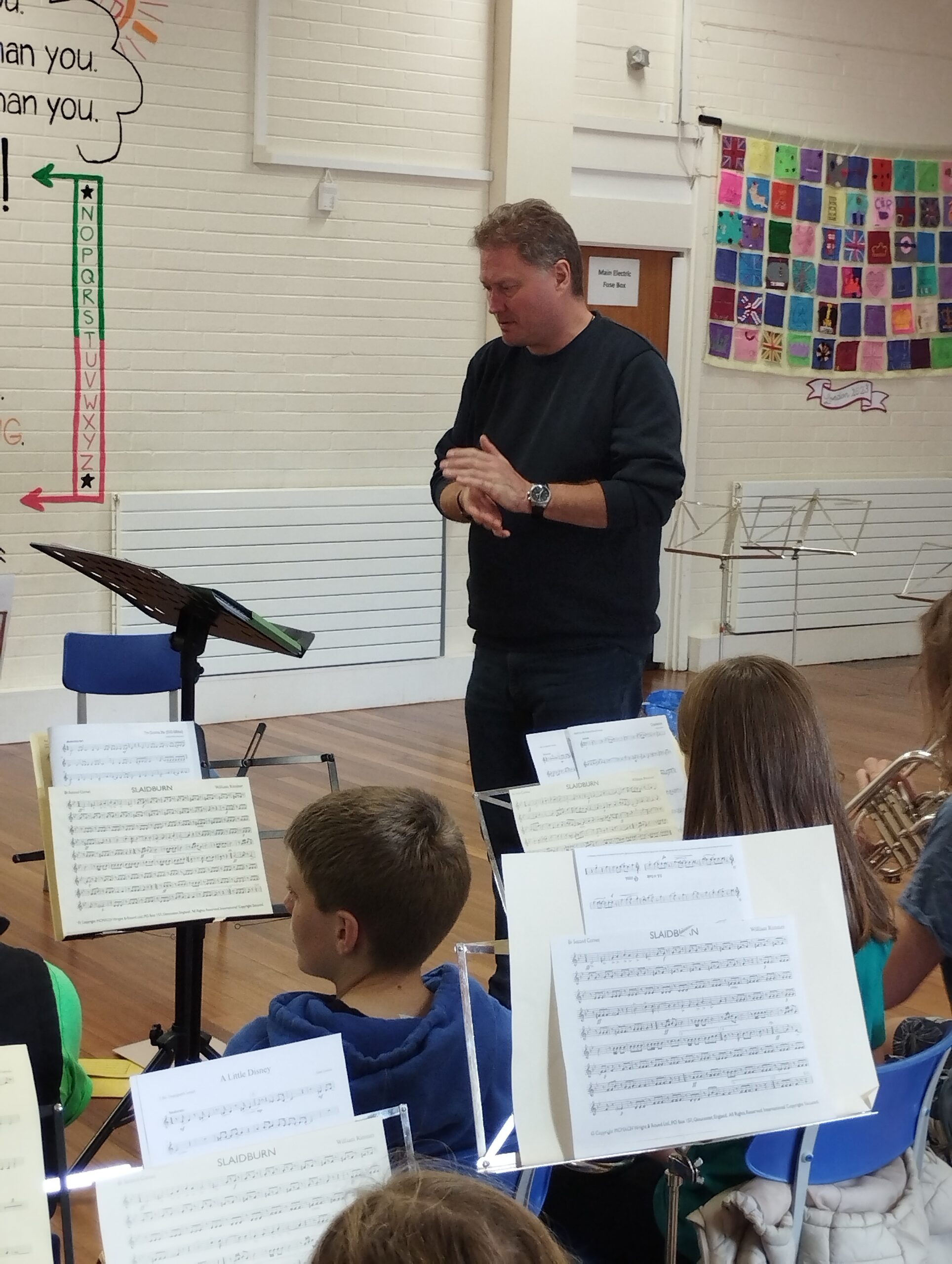 A group of young musicians playing their cornets.